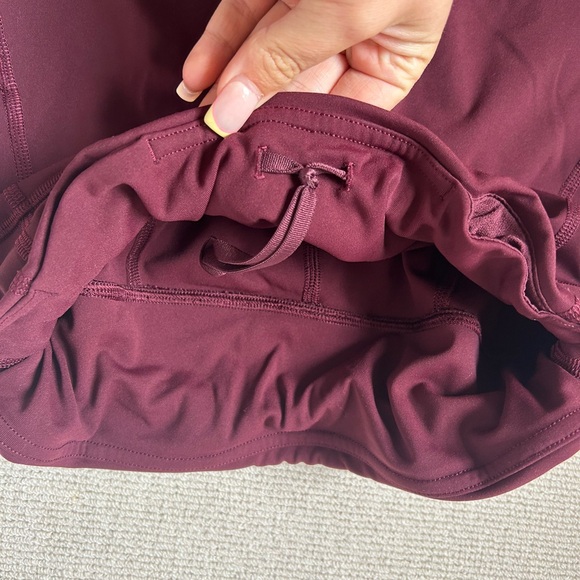 Lululemon Leggings With Adjustable Waistband and Pockets in a Marroon color - Picture 2 of 5